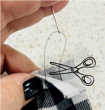 Close up of a person tying the end of the thread.