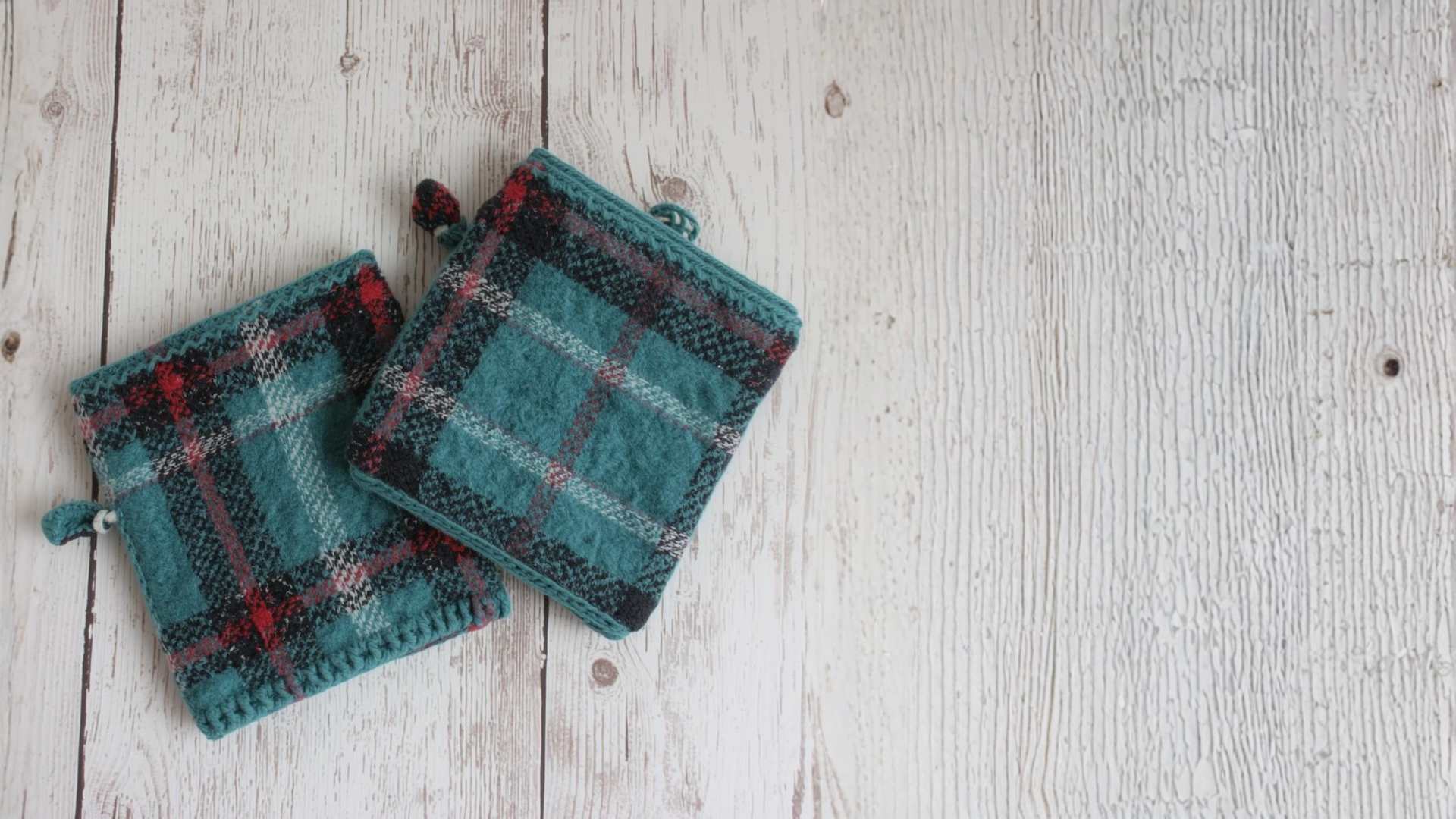 two flannel handwarmers