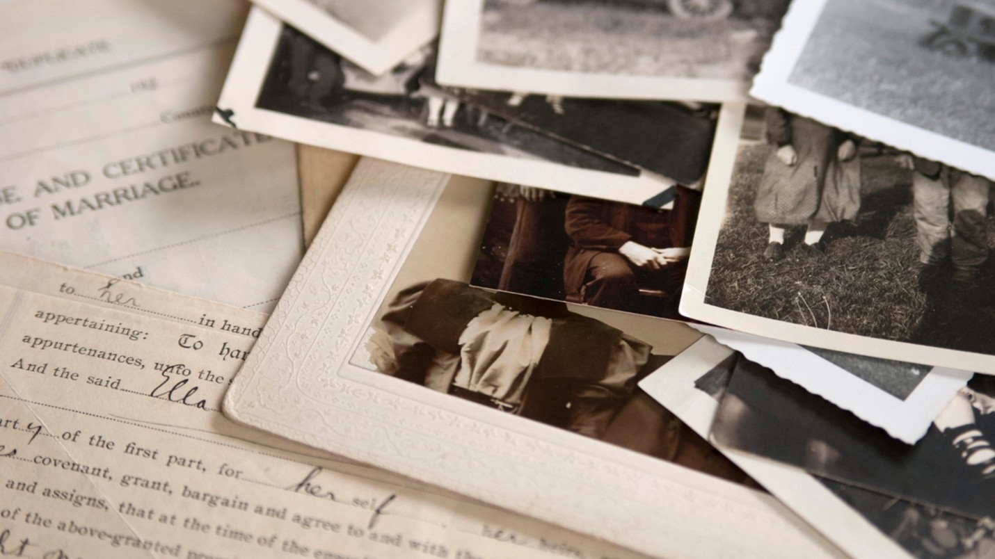 Assortment of antique photos and documents